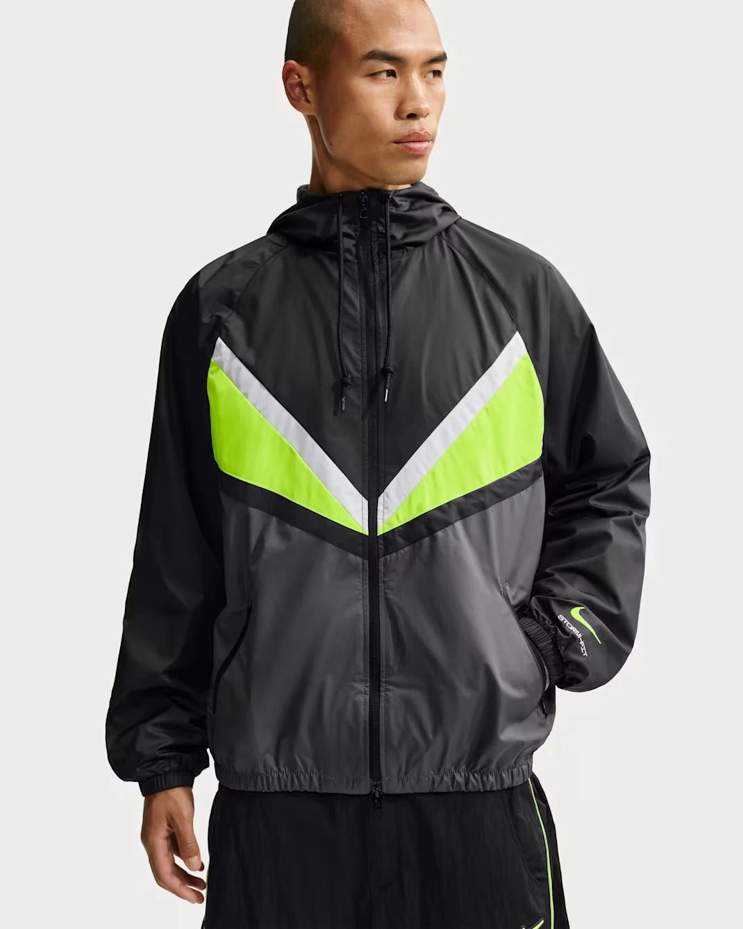 Nike Windrunner Lined Jacket in Black, Anthracite and Neon Yellow.