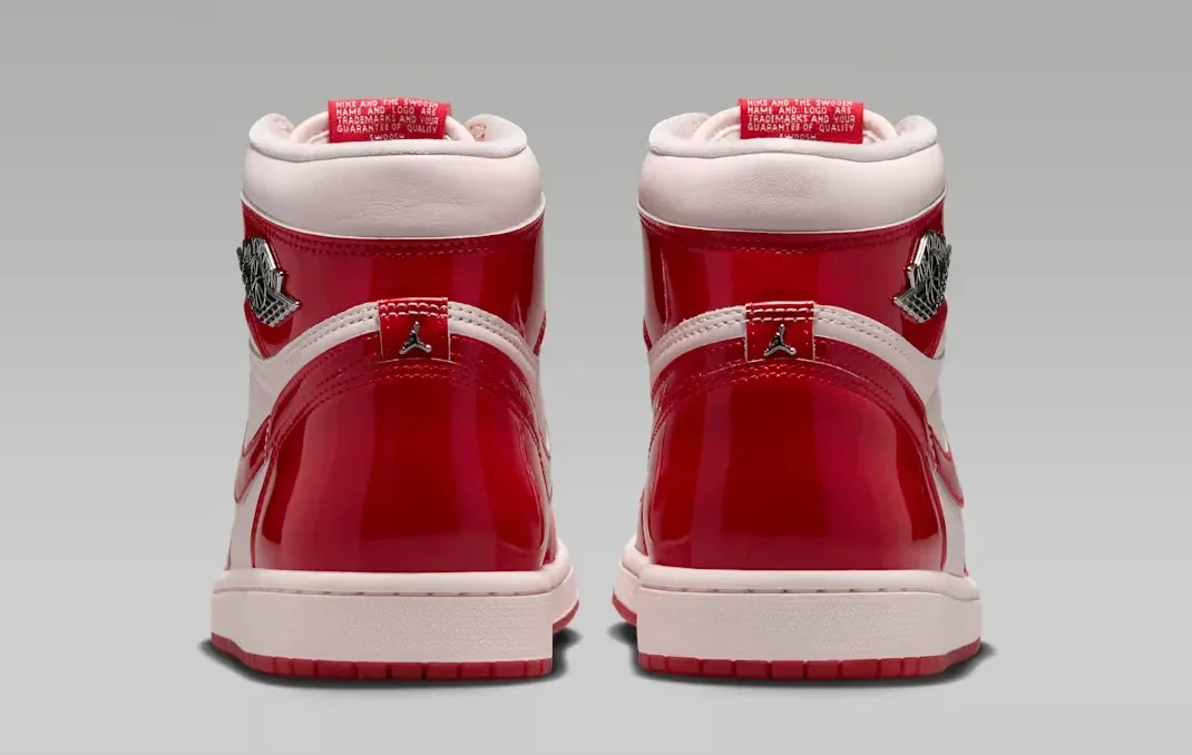 Rear view of Air Jordan 1 High OG Nails and Grails with University Red heels and Metallic Silver details