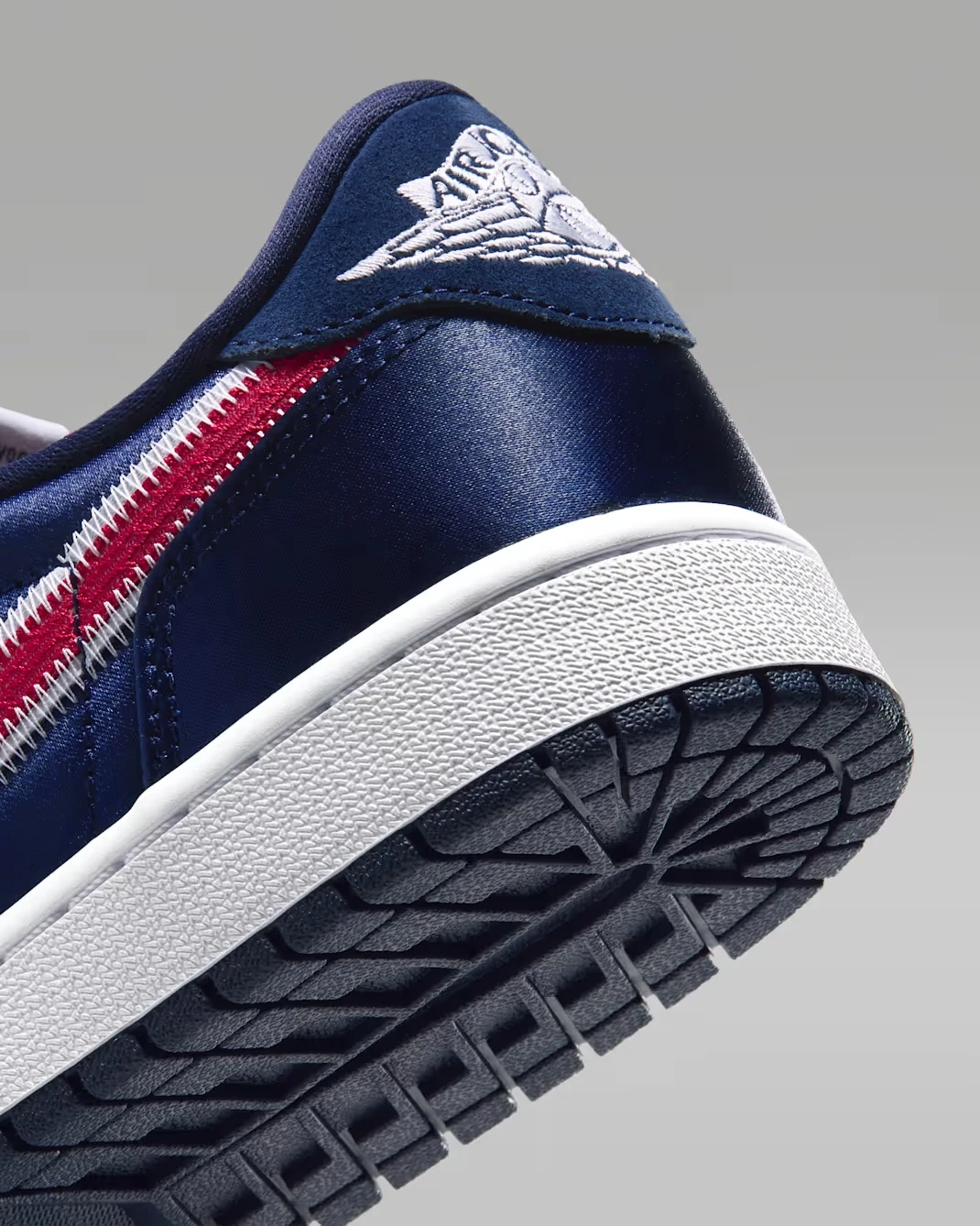 Air Jordan 1 Low OG “Howard” College Navy heel with White Wings logo
