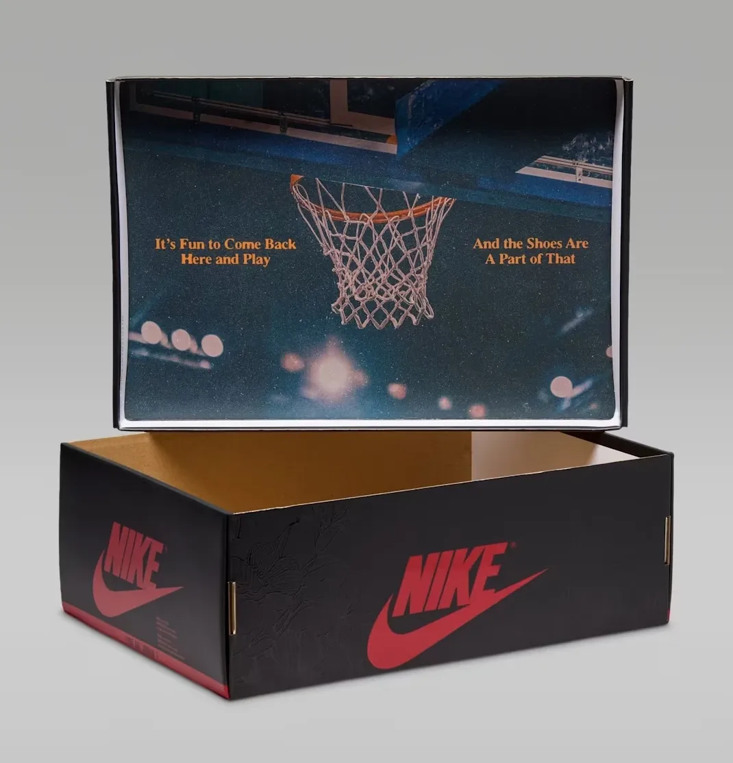 Black, red and gold shoebox for the Air Jordan 1 Low OG Welcome to the Garden.