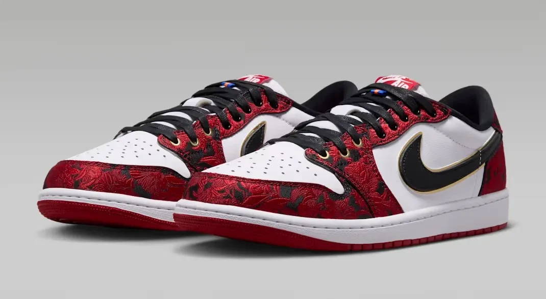Pair of Air Jordan 1 Low OG Welcome to the Garden sneakers in white, red, black and gold.