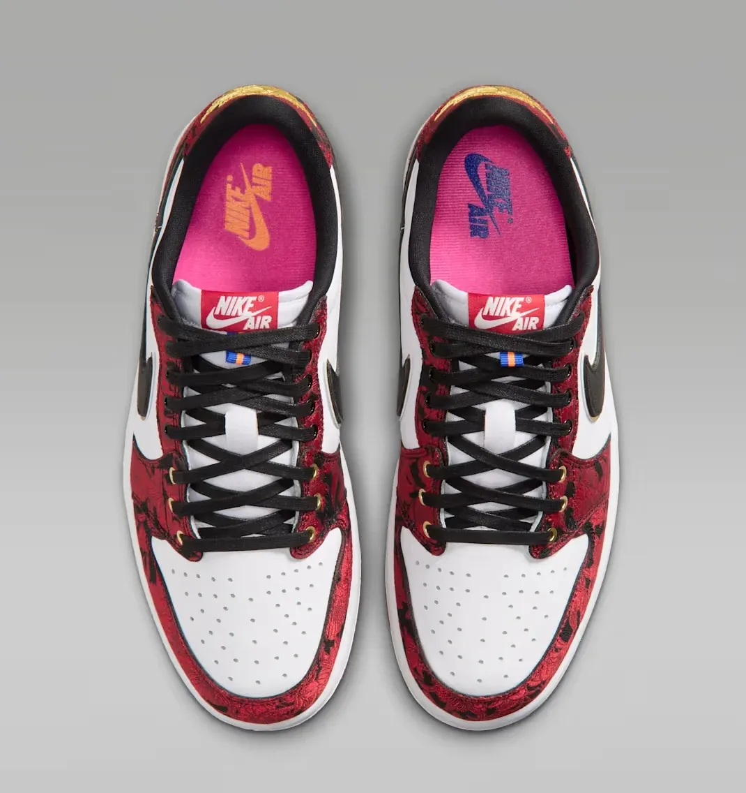 Top view of the Air Jordan 1 Low OG Welcome to the Garden in white, red, black and pink.