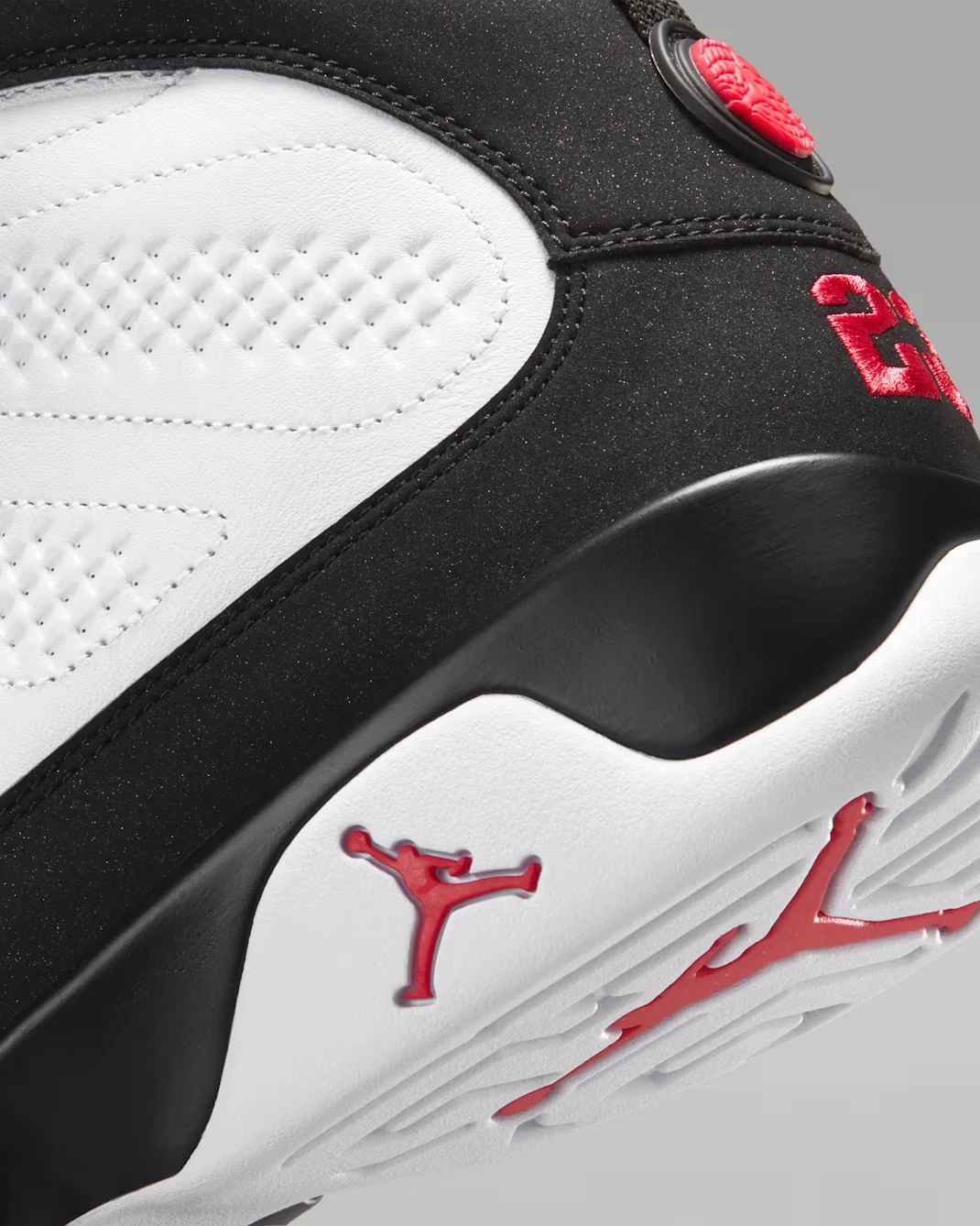 Close-up of the Air Jordan 9 Space Jam black heel, white midsole and True Red details.
