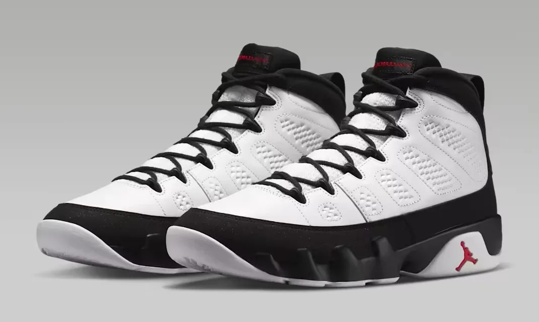 Pair of Air Jordan 9 Space Jam sneakers in White, Black and True Red.