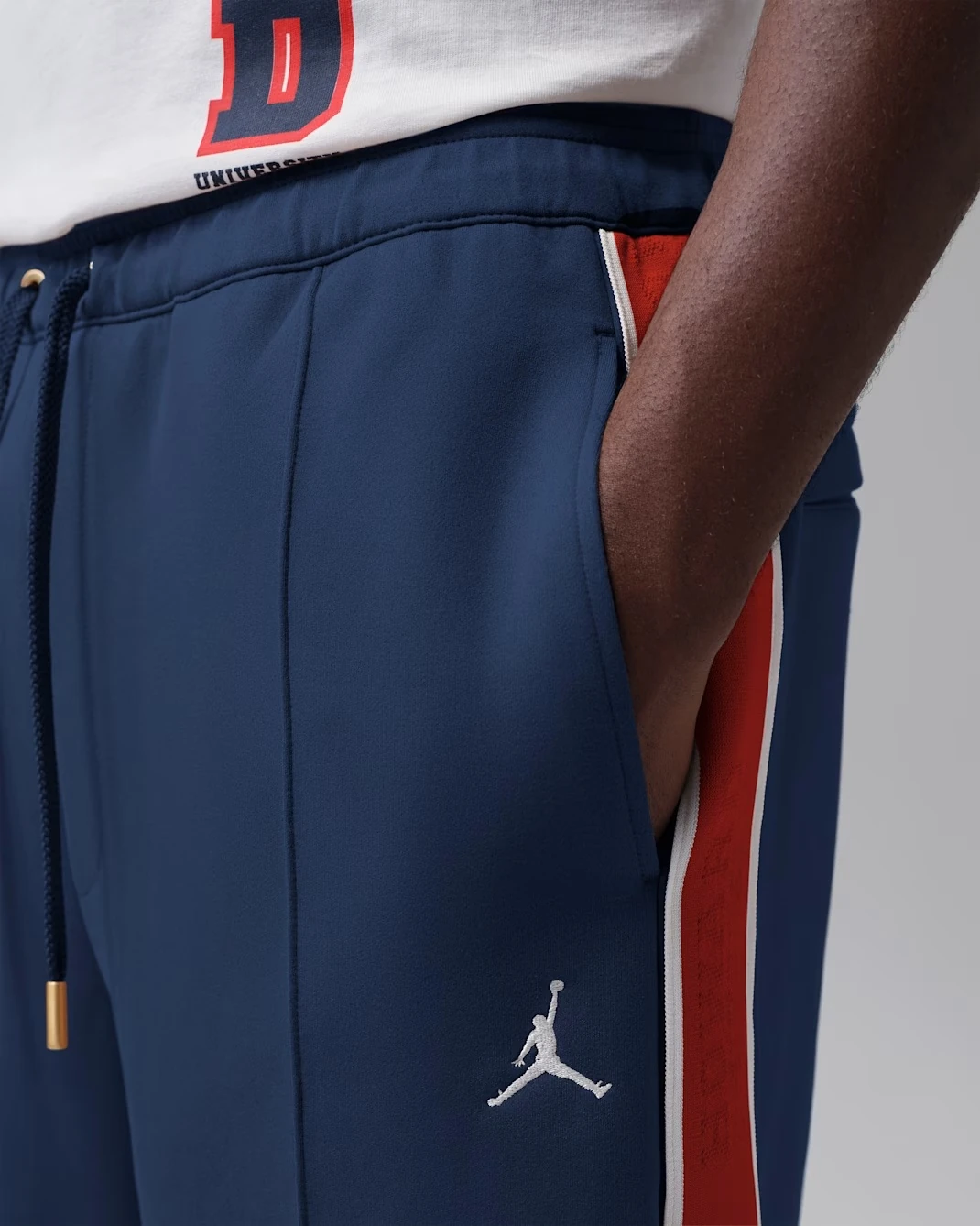 Detail of Air Jordan x Howard University pants in College Navy, University Red and White
