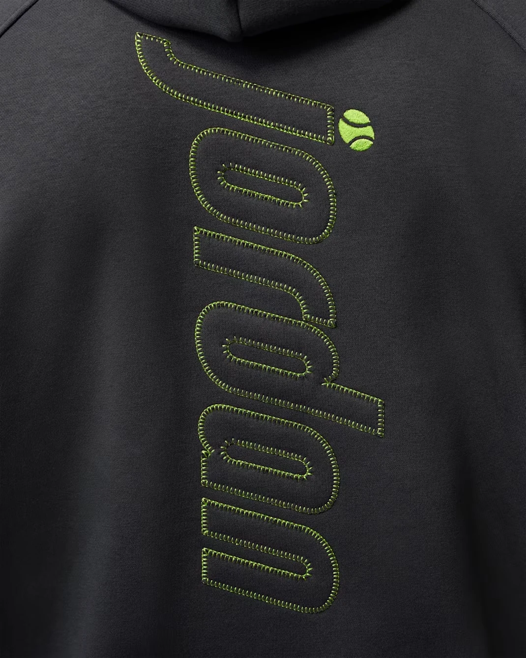 Lime Blast Jordan lettering and tennis ball graphic on the back of the Anthracite 23-Love hoodie.