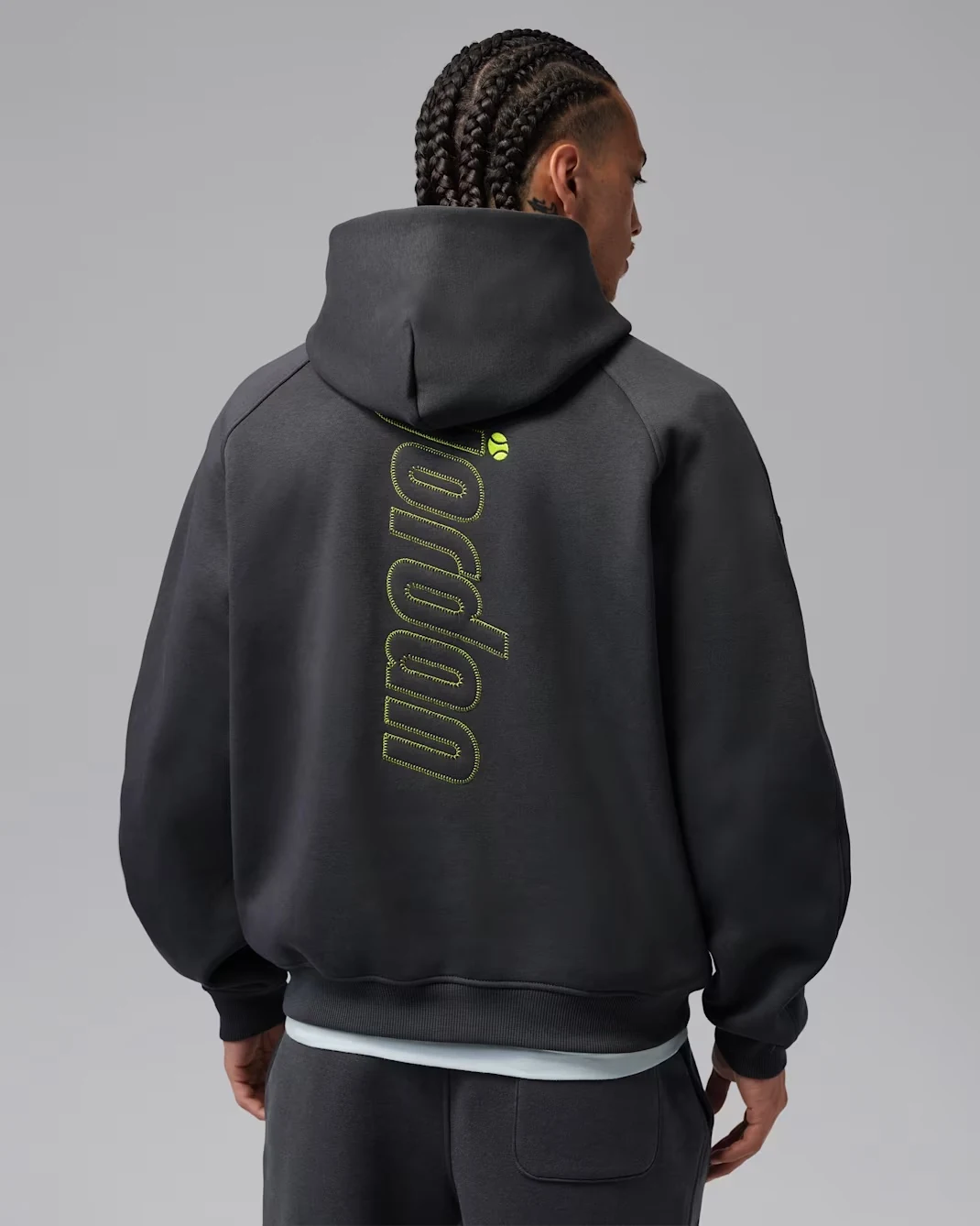 Back view of the Jordan Brooklyn Fleece 23-Love hoodie in Anthracite with Lime Blast tennis-inspired graphics.