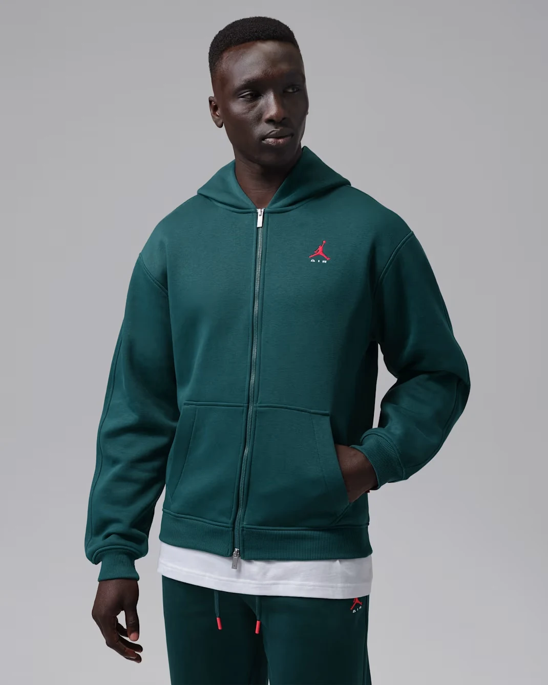 Jordan Brooklyn men's full-zip hoodie in Midnight Spruce with University Red Jumpman logo.