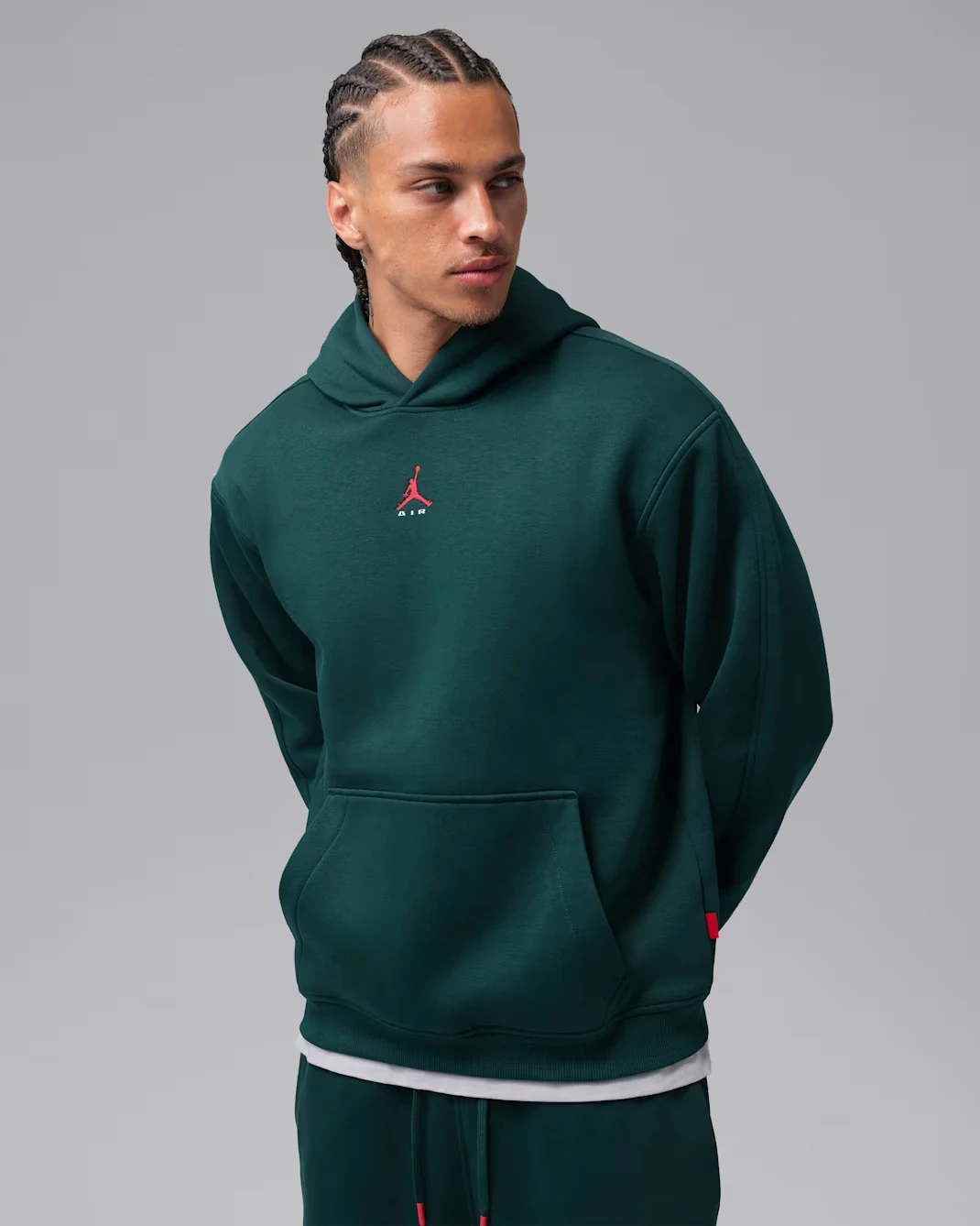 Jordan Brooklyn men’s pullover hoodie in Midnight Spruce with University Red Jumpman branding.