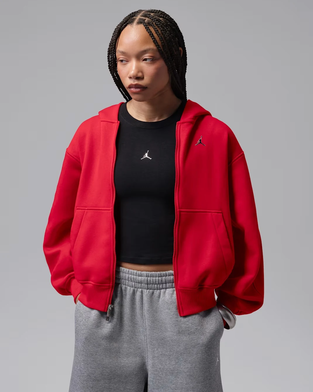 Close-up of Jordan Brooklyn women’s full-zip hoodie in Gym Red with Metallic Silver Jumpman