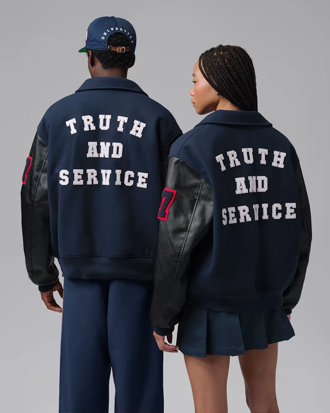 Back view of Jordan Flight x Howard University varsity jacket in College Navy, Black and University Red