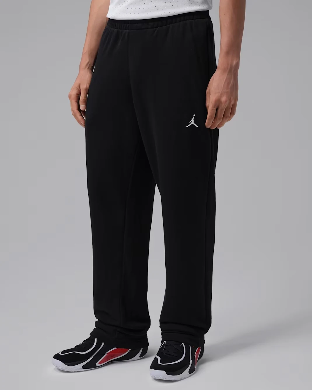 Black Jordan Sport Crossover fleece pants with white Jumpman logo