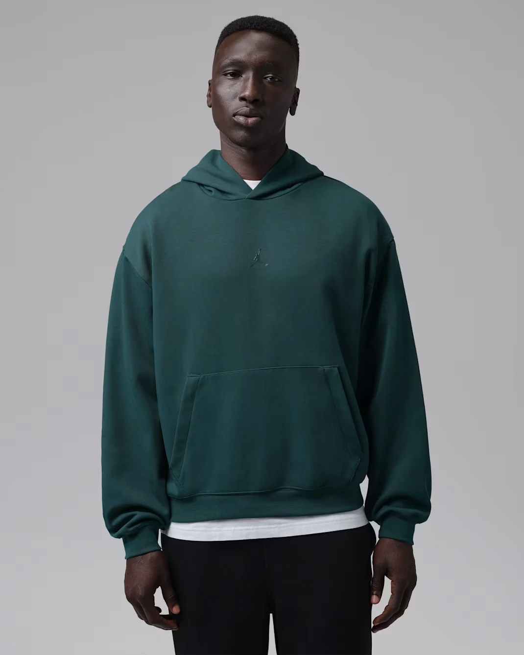 Jordan Sport Hoop Fleece men's Dri-FIT pullover hoodie in Midnight Spruce with tonal Jumpman logo.