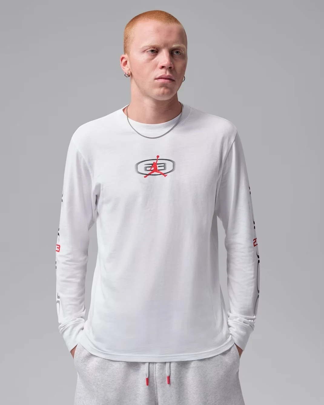 Jordan Sport Men’s Dri-FIT Long-Sleeve T-Shirt in White and University Red