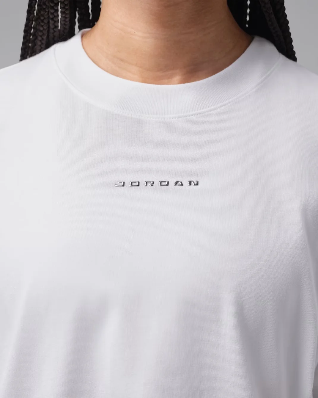 Close-up of the white Jordan Flight graphic T-shirt with black Jordan lettering.