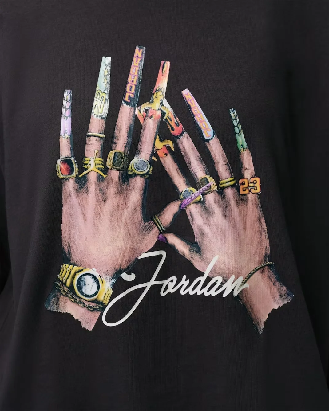 Multicolor nail-inspired Jordan graphic on the Off Noir Women’s Graphic Girlfriend T-Shirt.