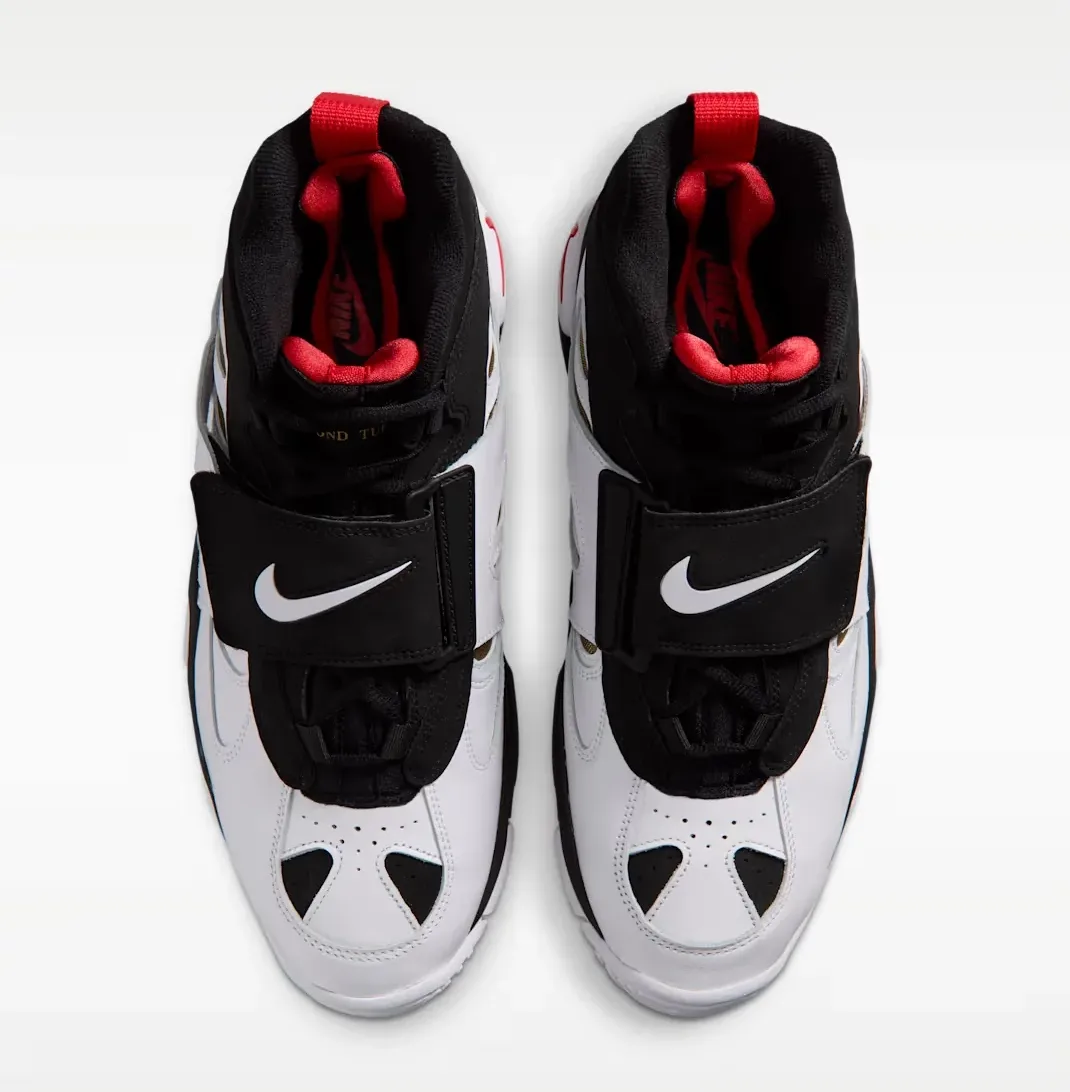 Top view of the Nike Air Diamond Turf 2 with black straps, white uppers and red lining.