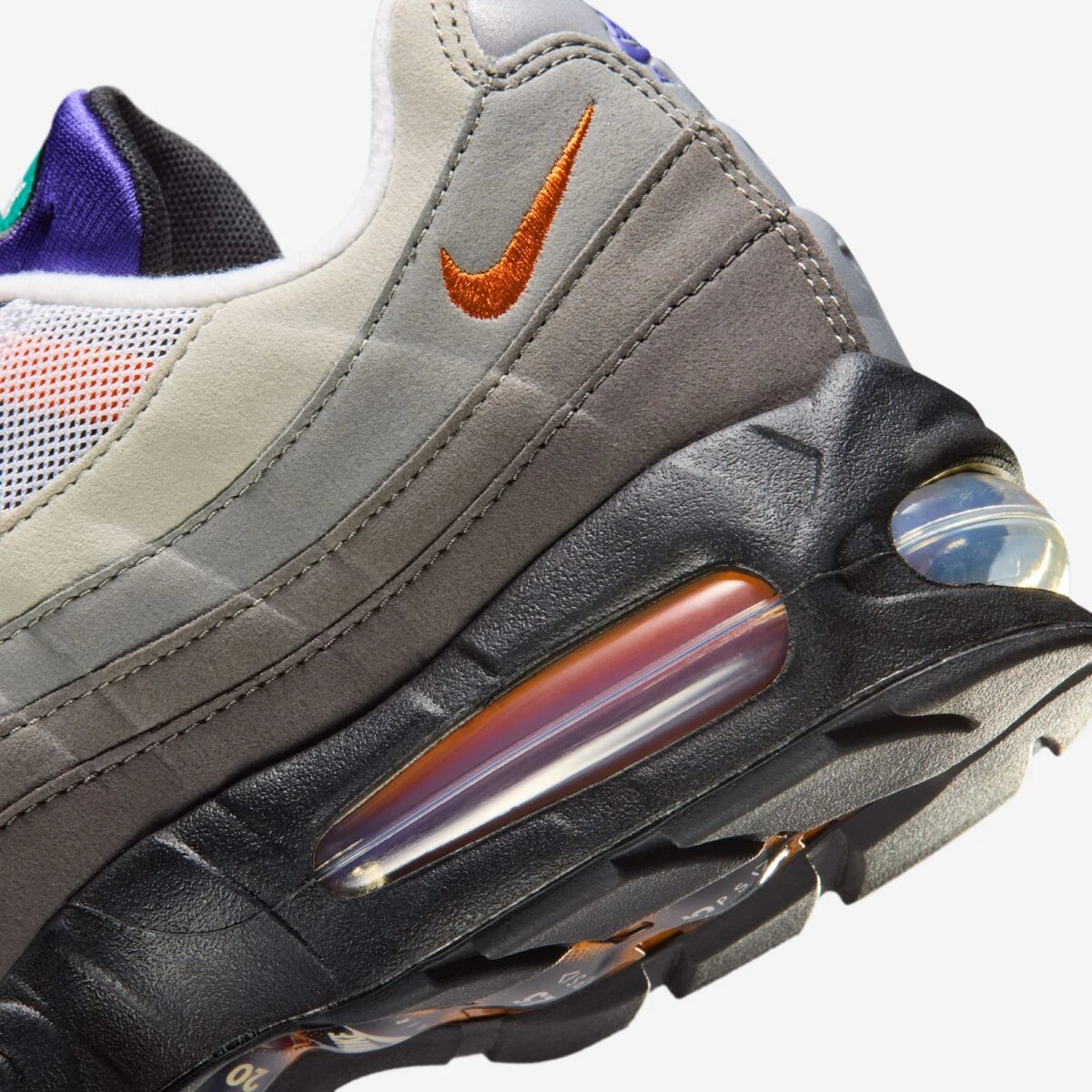 Close-up of the Nike Air Max 95 Greedy Air bubble with Medium Ash panels and Bright Mandarin Swoosh.