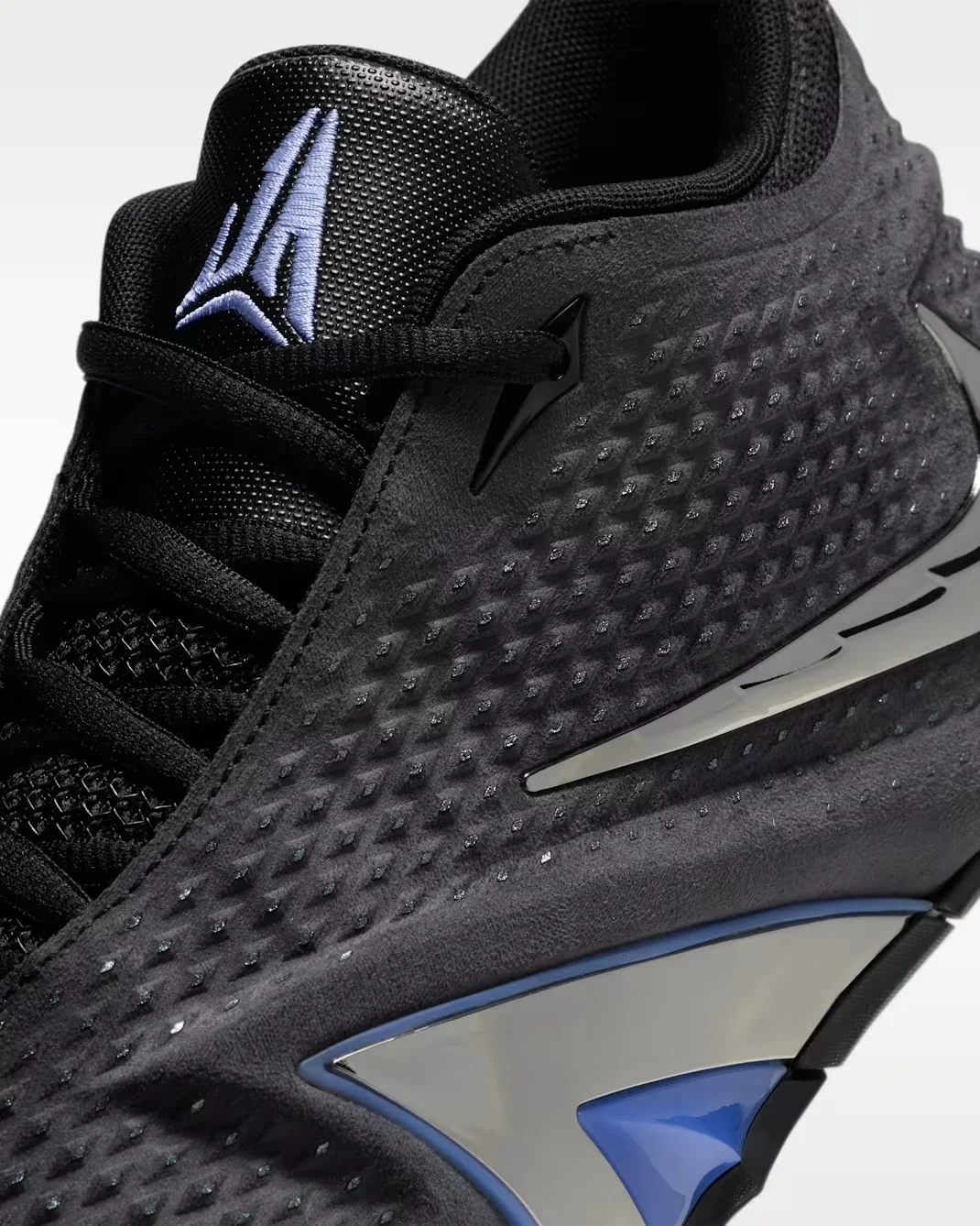 Nike Ja 4 Dark Mode textured upper and Cobalt Bliss Ja logo detail