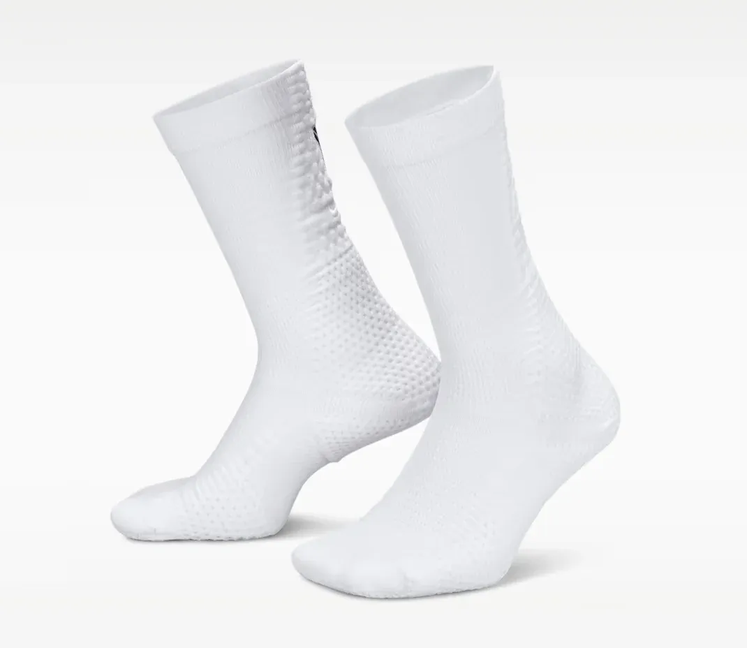 White Nike Kobe Unicorn Dri-FIT ADV crew socks shown from the side