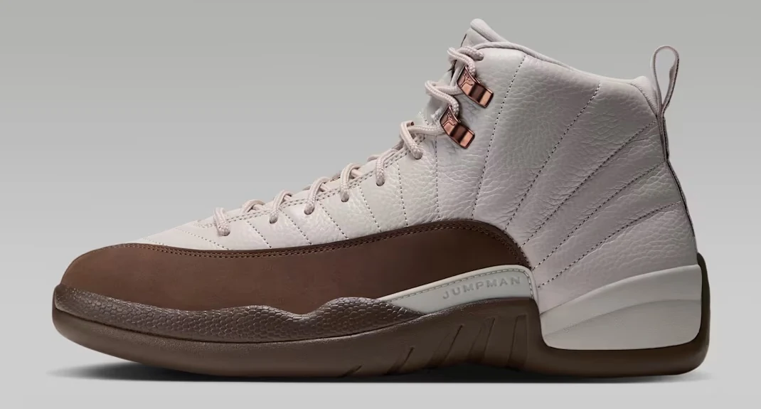 Air Jordan 12 Fireside sneakers featuring a light-colored leather upper, brown mudguard, metallic eyelets and matching brown outsole, shown from the side.