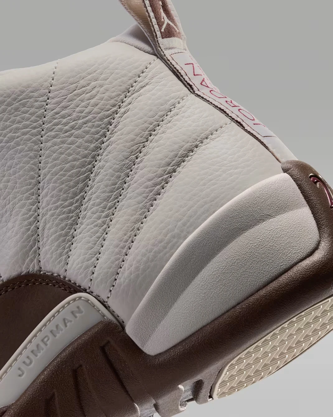 Close-up of the Air Jordan 12 Fireside heel featuring Light Orewood Brown leather, Jordan heel tab and Cacao Wow sole