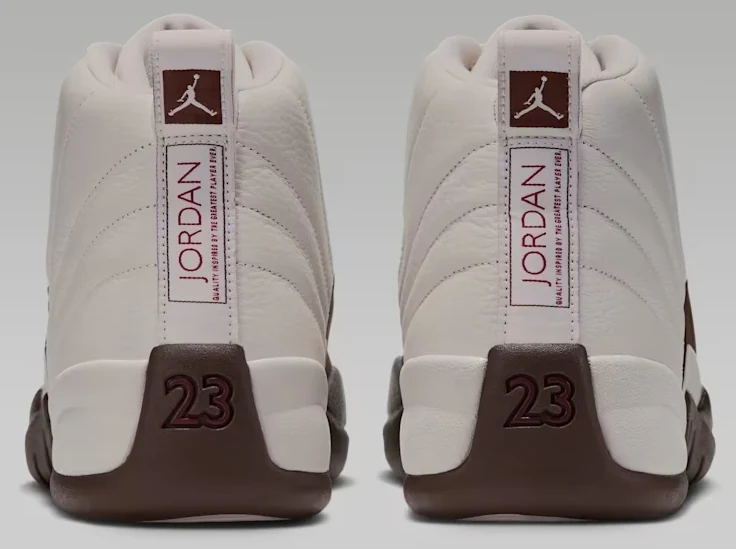 Rear view of the Air Jordan 12 Fireside sneakers showing white heel tabs, Jordan branding and Cacao Wow heels with number 23