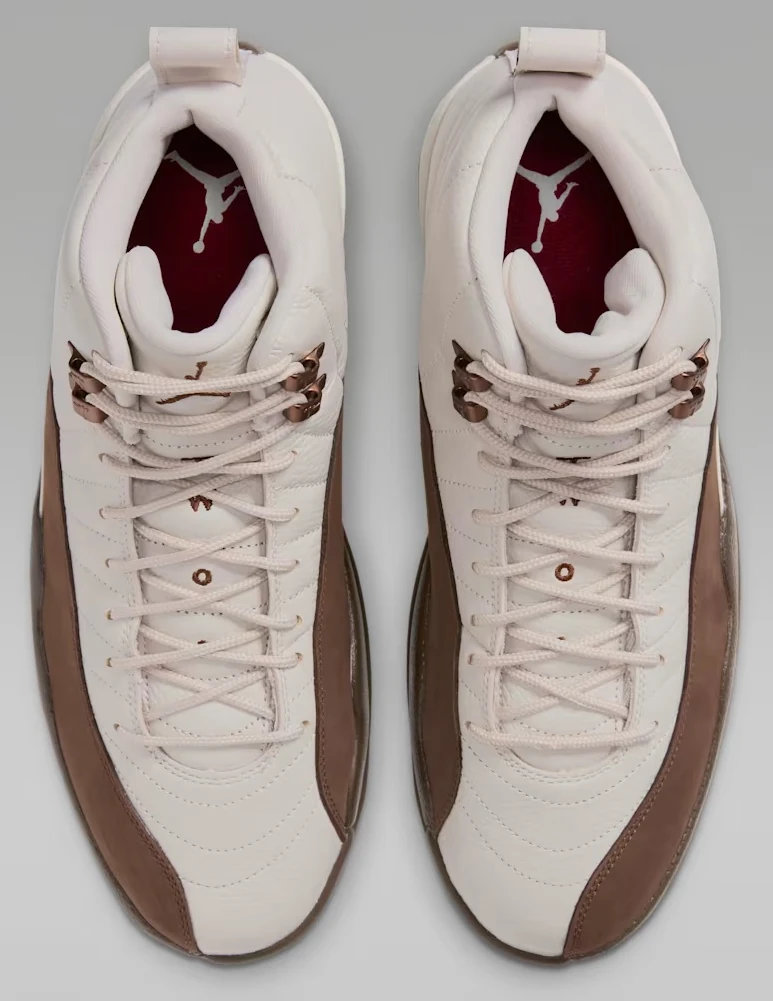 Top view of the Air Jordan 12 Fireside sneakers with Light Orewood Brown laces, brown side panels and Team Red insoles