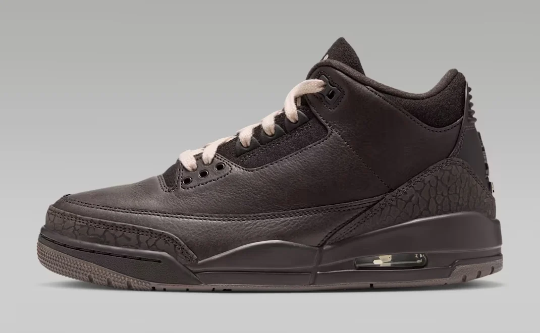 Women's Air Jordan 3 Fireside sneaker featuring a dark brown leather upper, elephant-print overlays, cream laces and visible Air cushioning, shown from the side.