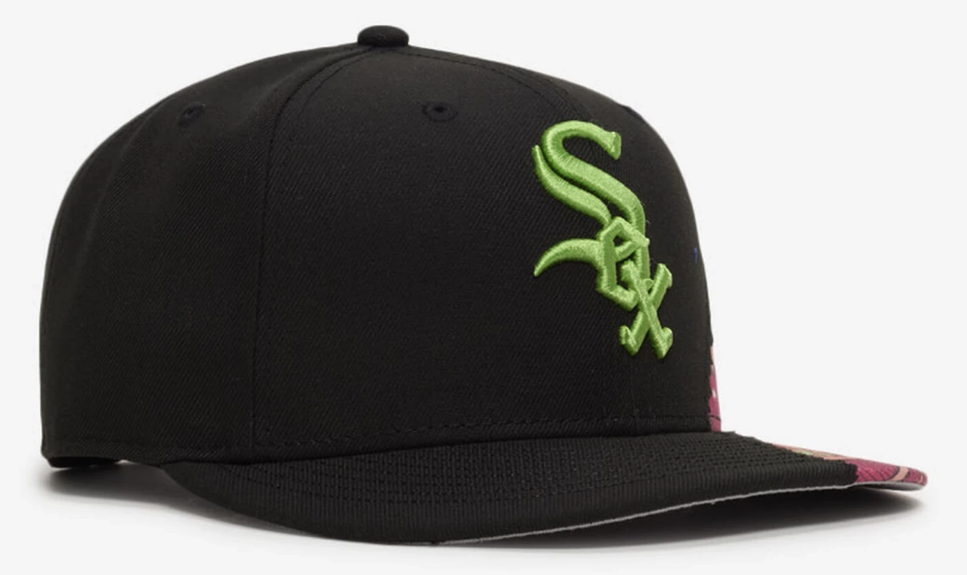 Chicago White Sox New Era Brains 9FIFTY black snapback hat with lime green embroidered Sox logo and pink accents, paired with the Air Jordan 5 Halloween colorway.