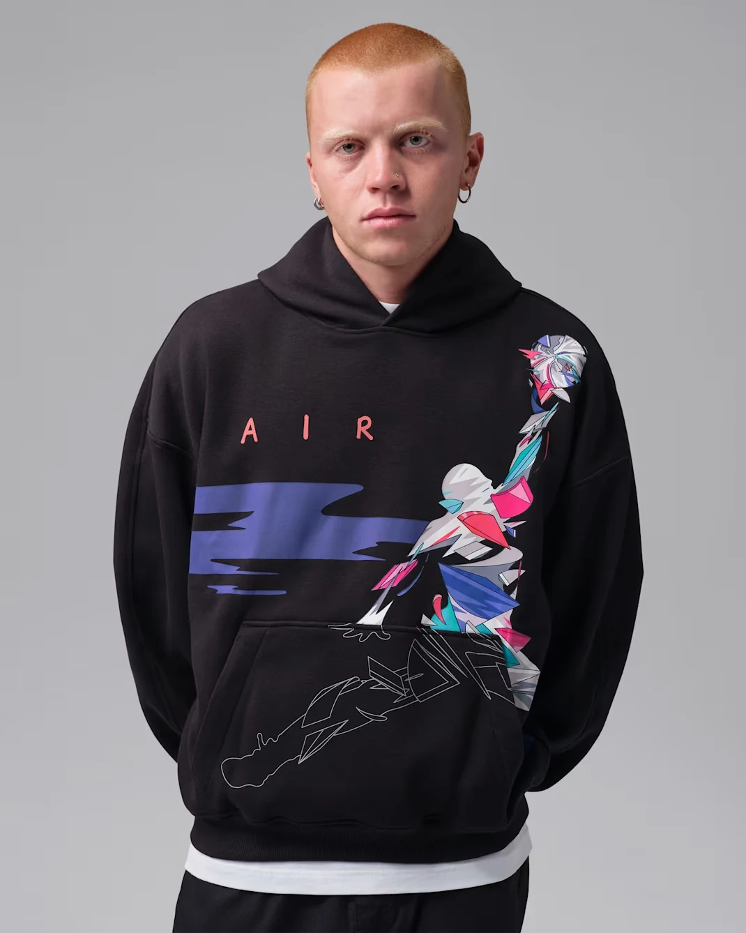 Front view of Jordan Brooklyn Art Series oversized graphic fleece hoodie in black