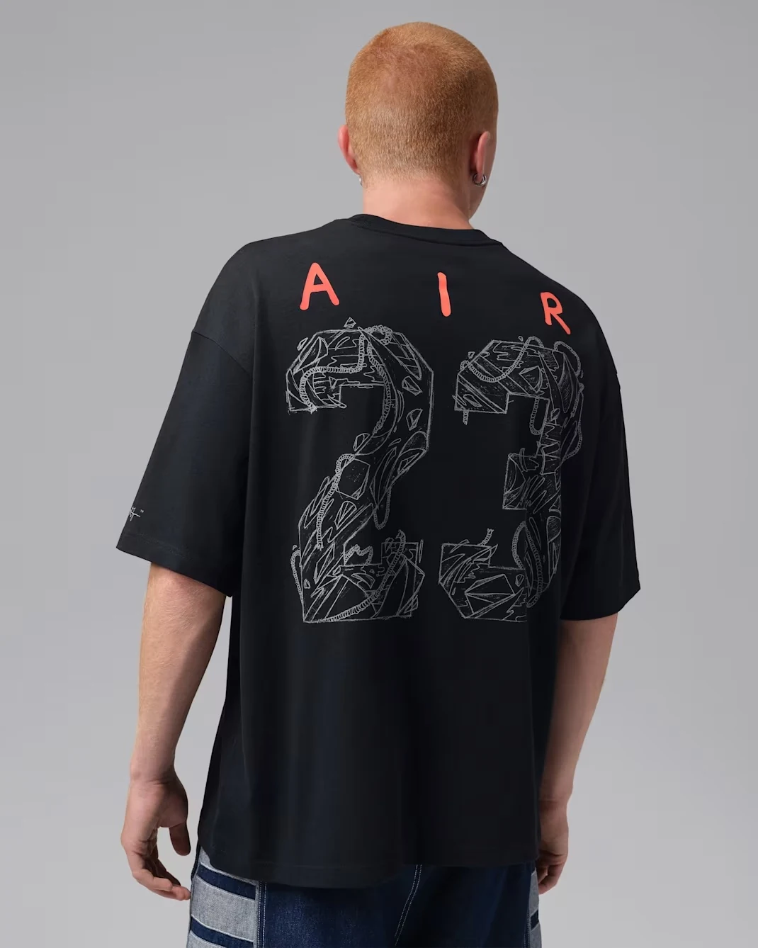 Back view of Jordan Brooklyn Art Series oversized graphic T-shirt in black