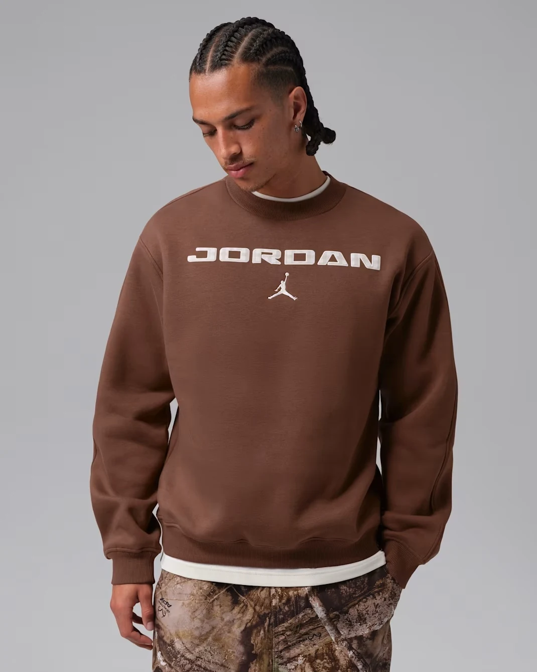 Model wearing Sail Jordan Brooklyn fleece crew sweatshirt with brown Jordan lettering
