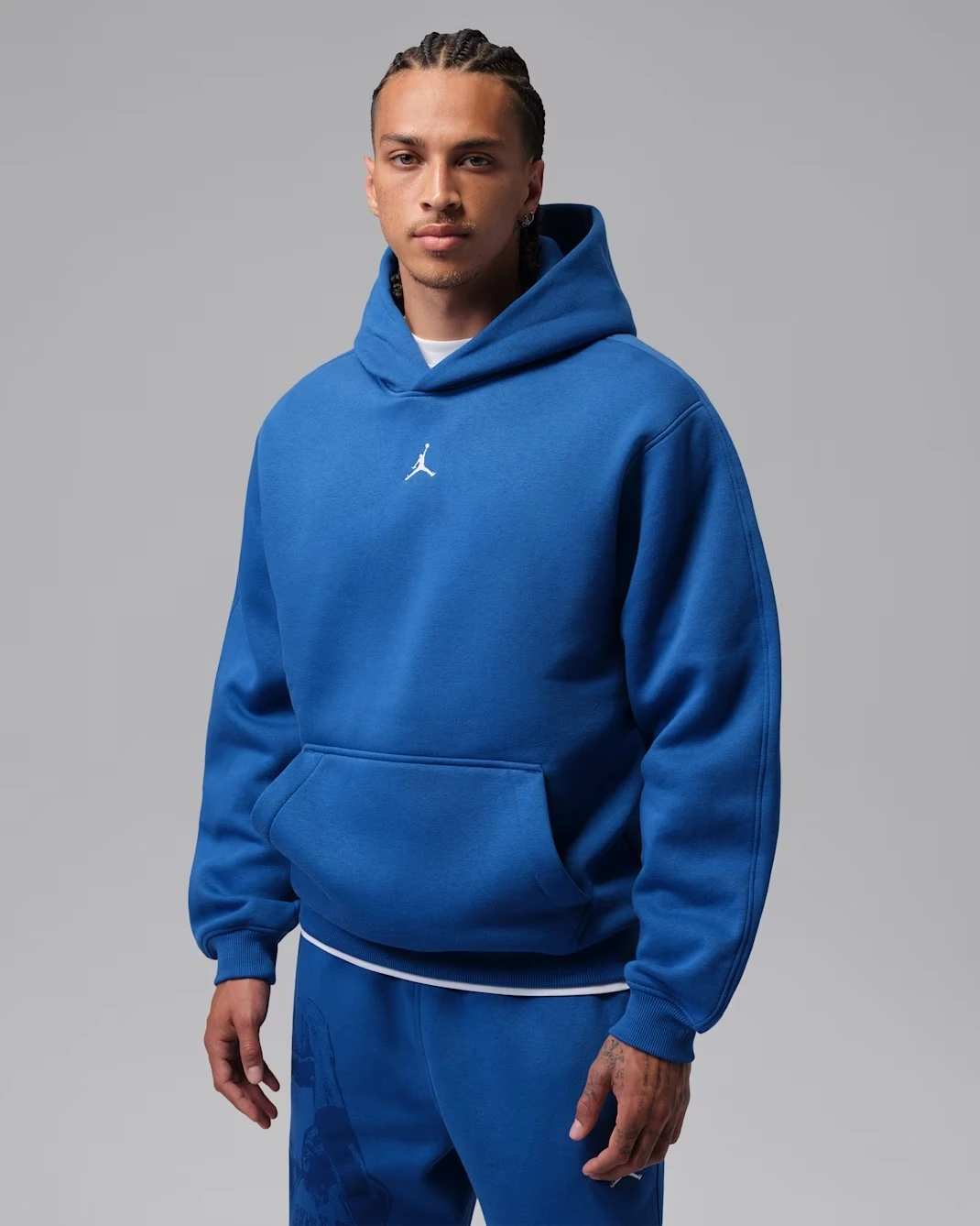 Front view of royal blue Jordan Brooklyn Fleece pullover hoodie with white Jumpman logo