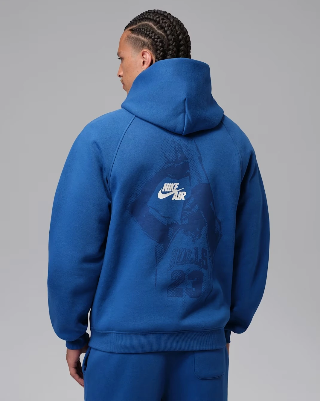 Back view of royal blue Jordan Brooklyn Fleece pullover hoodie with Nike Air graphic