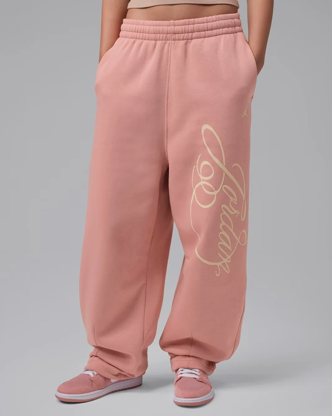 Jordan Brooklyn Fleece women’s Fireside pants in Rust Pink and Pearl White