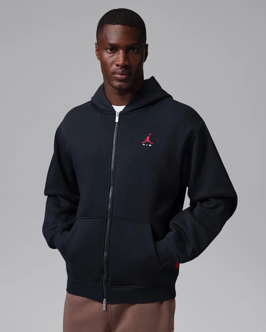 Black Jordan Brooklyn full-zip hoodie with small red Jumpman Air logo