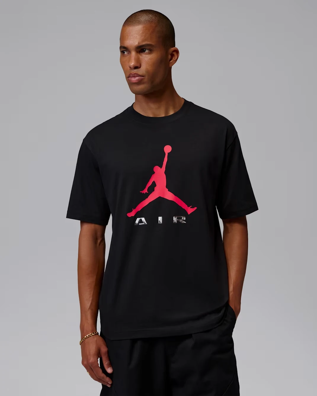 Black Jordan Brooklyn short sleeve T-shirt with red Jumpman graphic and Air lettering