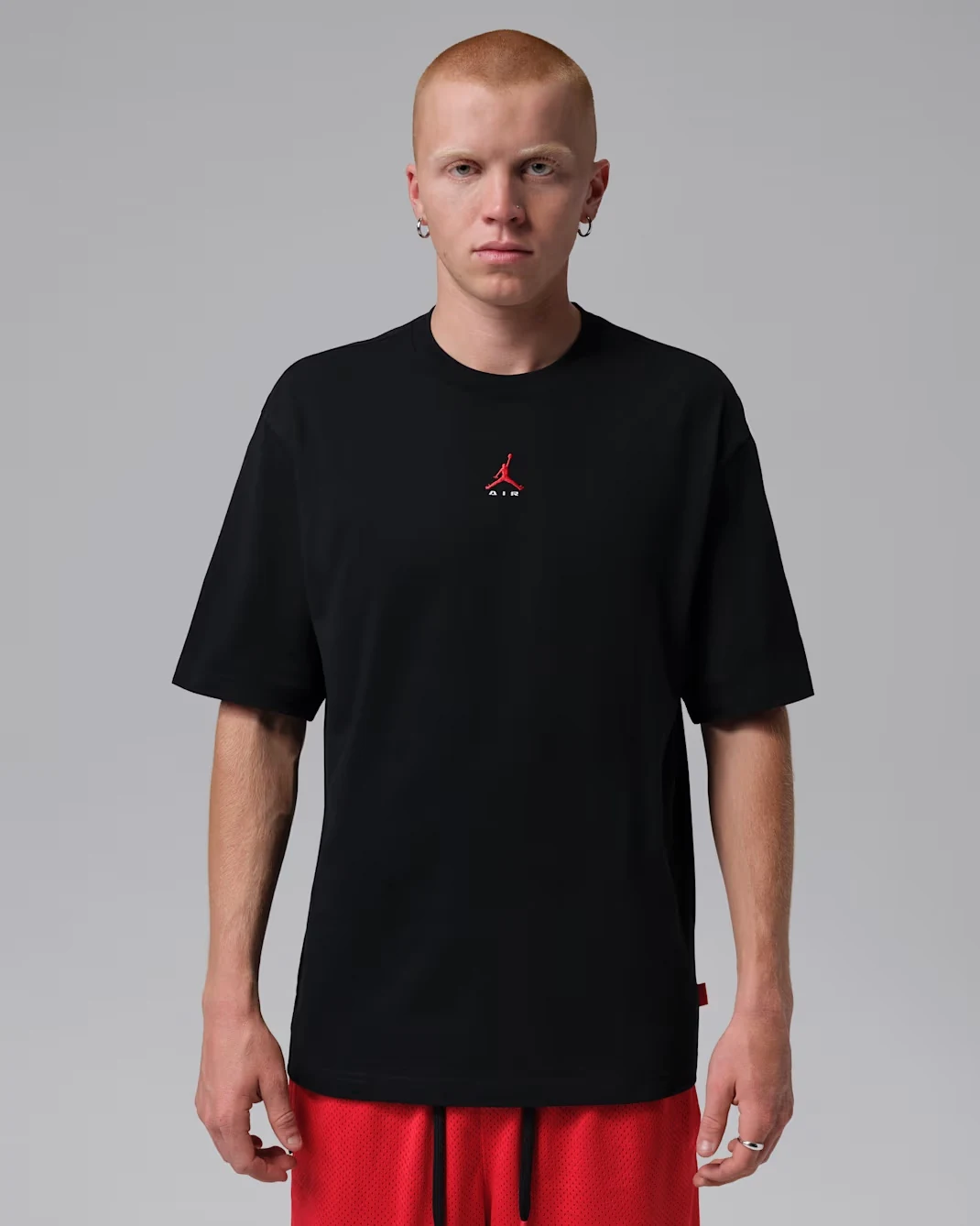 Jordan Brooklyn Men's Graphic T-Shirt in Black with University Red Jumpman logo on the front