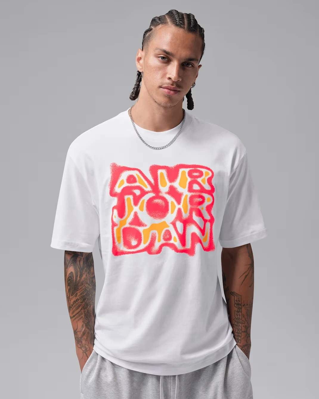 White Jordan Brooklyn men's graphic T-shirt with pink-red and orange lettering to match the Air Jordan 5 “Sunset”