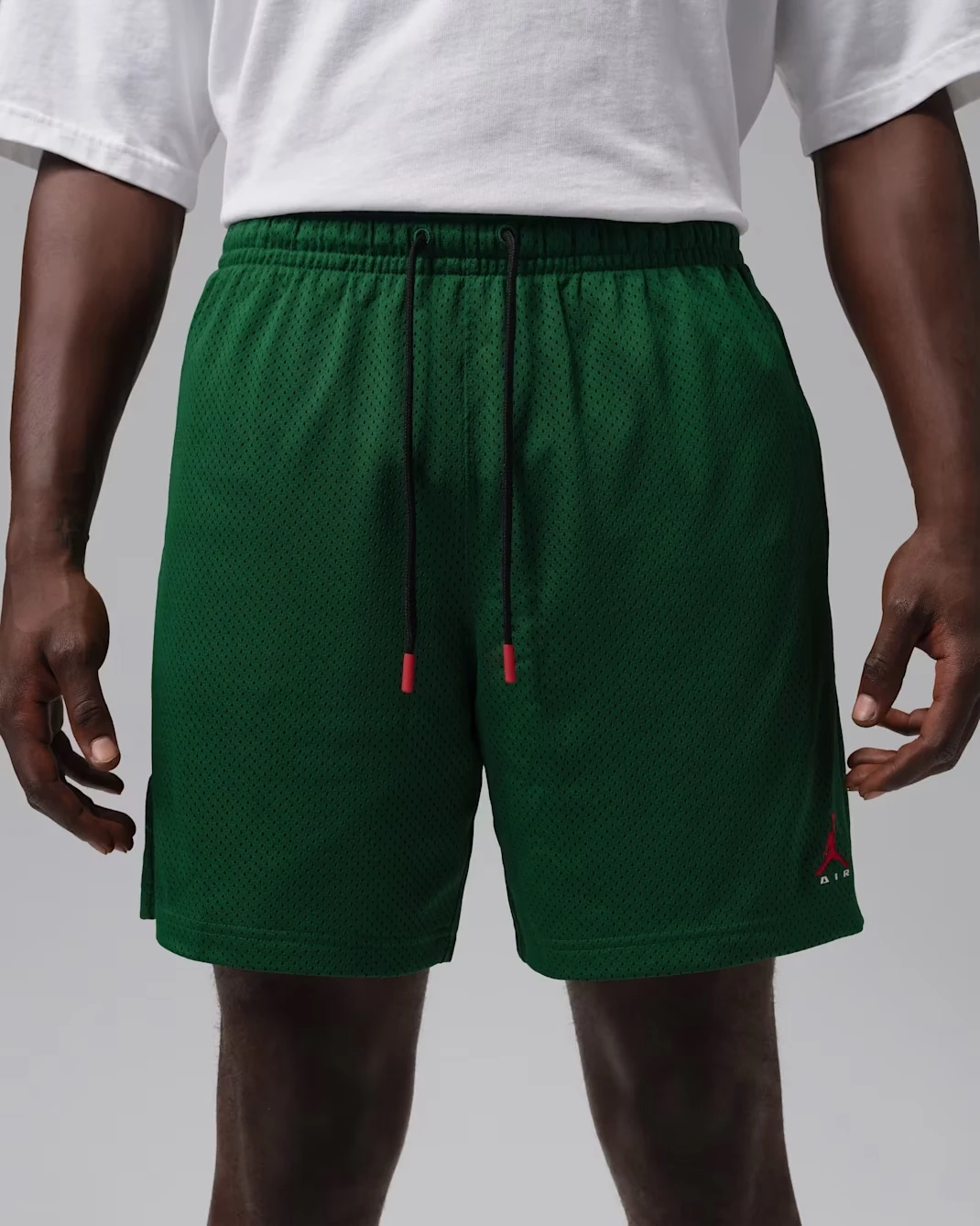 Jordan Brooklyn men's Gorge Green mesh shorts with adjustable drawstring waistband and University Red Jumpman logo.