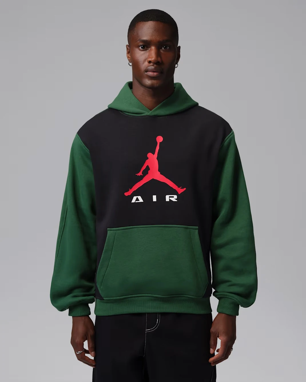 Jordan Brooklyn men's pullover hoodie in Gorge Green and black with University Red Jumpman logo.