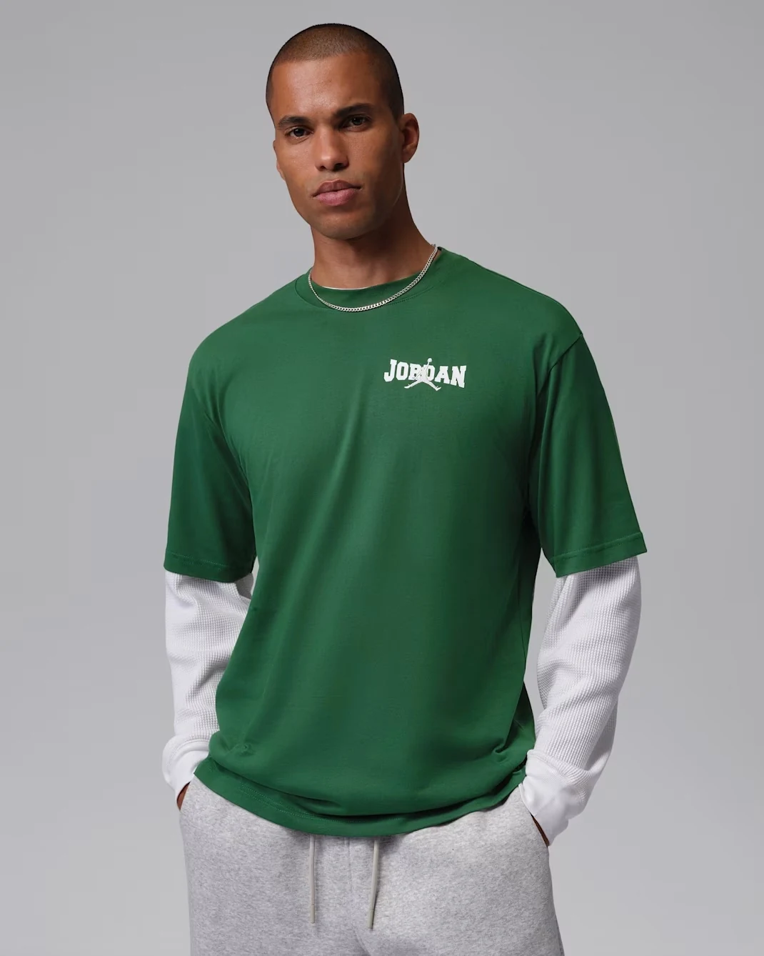 Front view of Jordan Brooklyn men's Gorge Green T-shirt featuring small white Jordan branding on the chest.