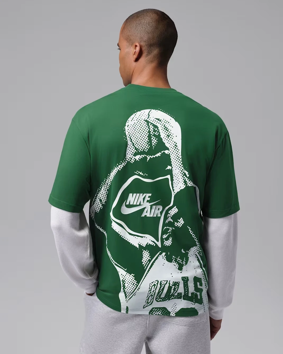 Back view of Jordan Brooklyn men's Gorge Green T-shirt featuring oversized white Michael Jordan graphic and Nike Air branding.