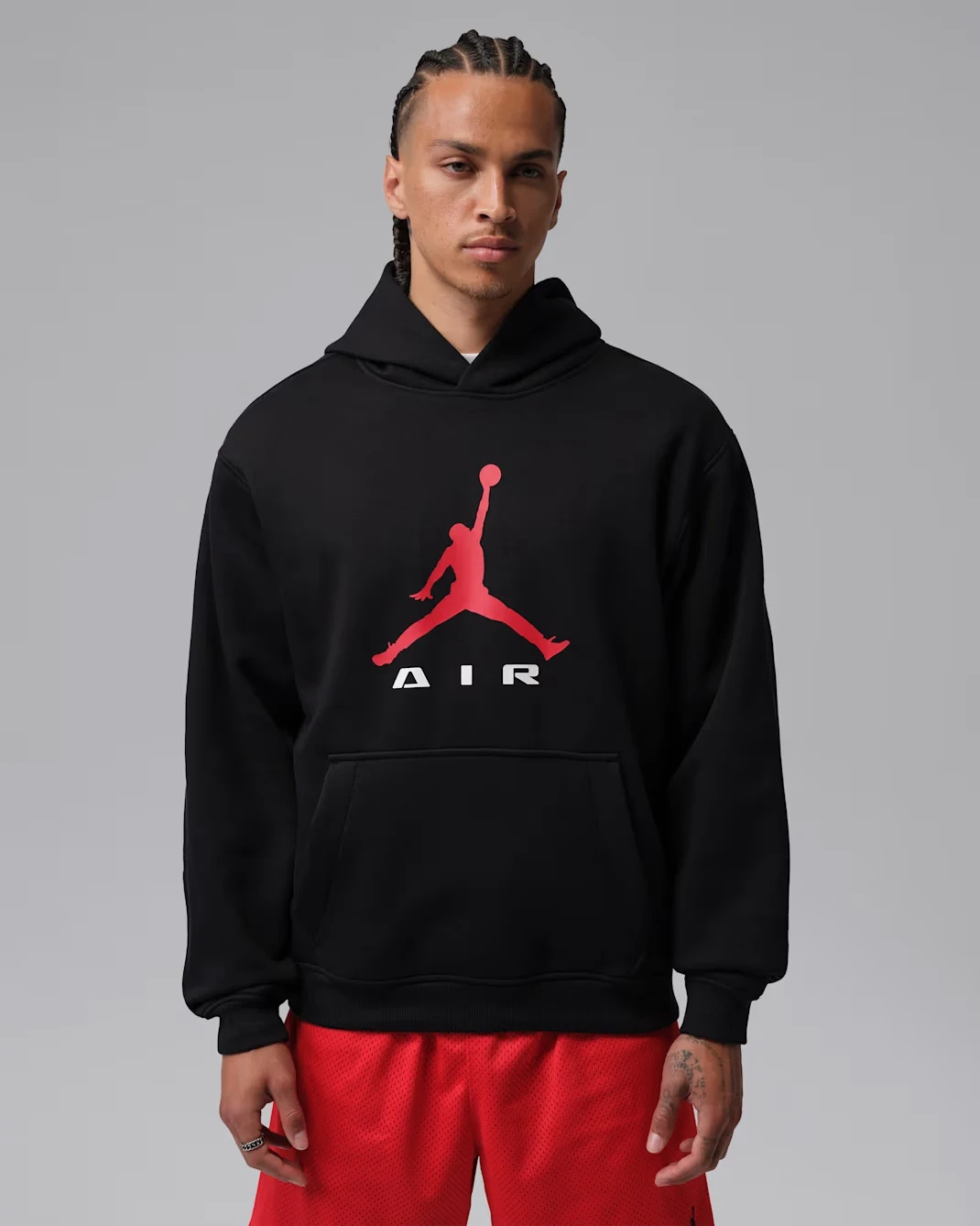 Black Jordan Brooklyn pullover hoodie with red Jumpman Air graphic on the front