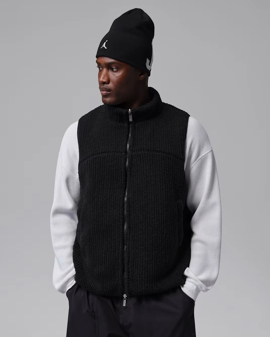 Jordan Flight Mountainside reversible vest shown on the Black side with White layering