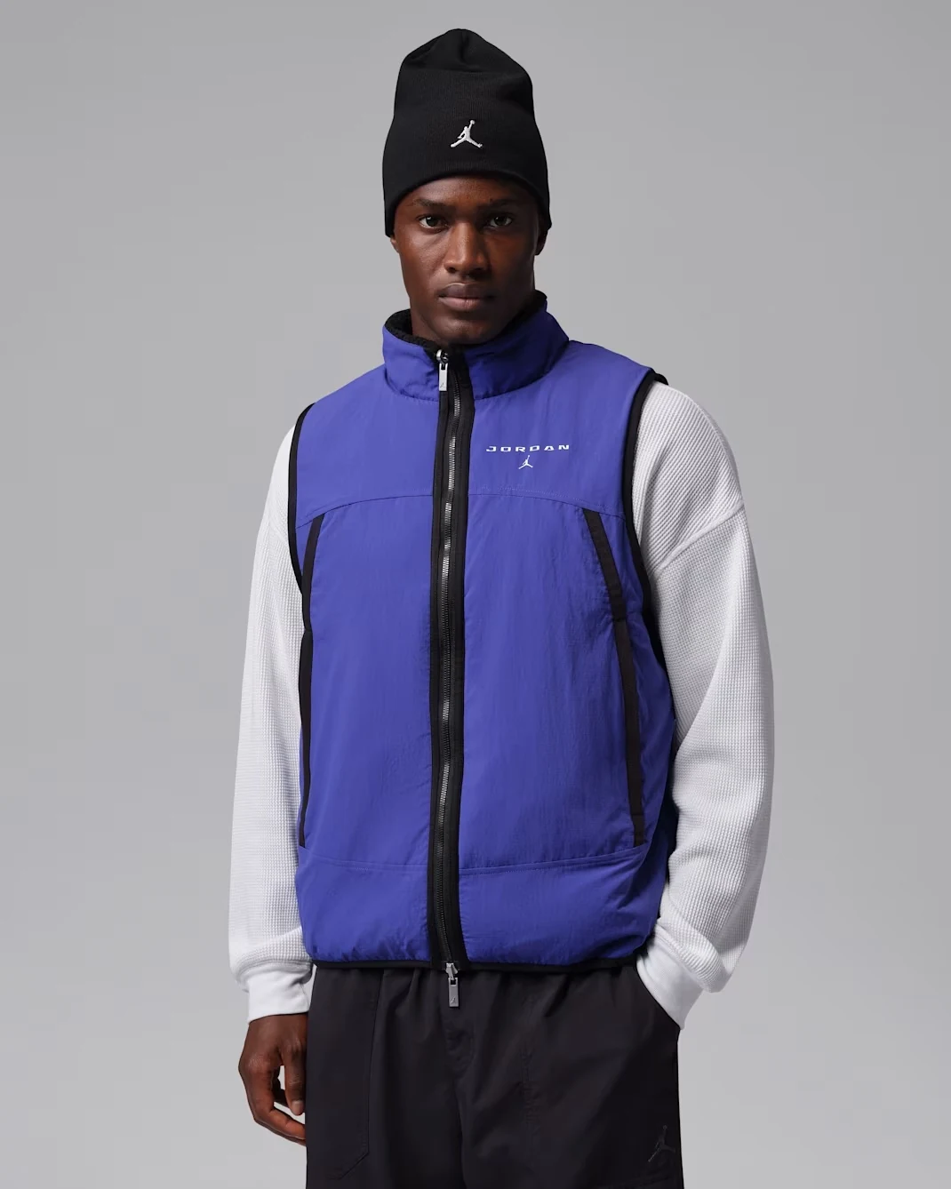 Jordan Flight Mountainside reversible vest shown in Light Concord and Black