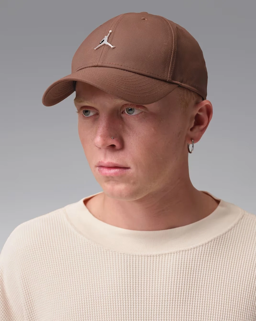 Front view of Fauna Brown Jordan Rise cap with metallic Jumpman logo