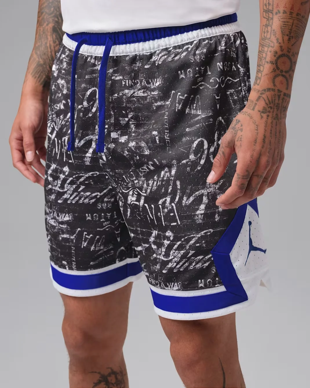 Jordan Tatum Sport Dri-FIT Diamond Basketball Shorts in black, white and blue with an allover graphic print to match the Jordan Tatum 5 Sunrise.