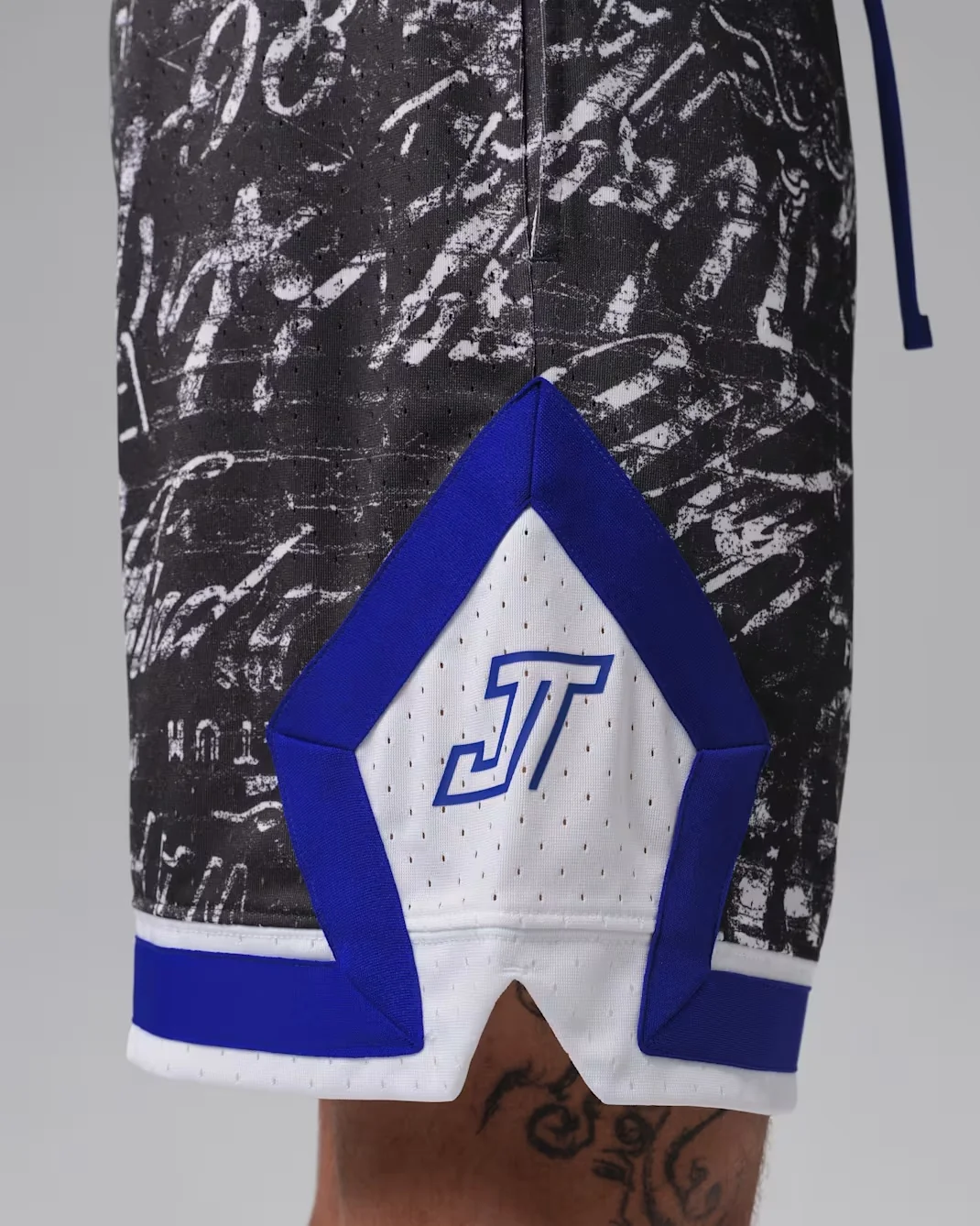Jordan Tatum Sport Diamond Basketball Shorts featuring a blue JT logo on a white panel with black and blue accents to match the Jordan Tatum 5 Sunrise.